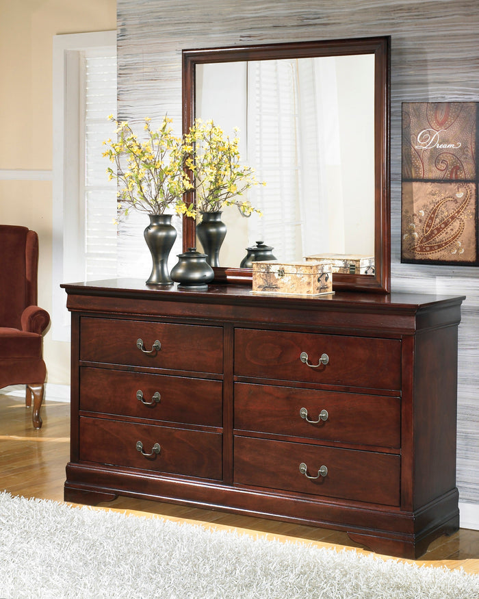 Rectangular bedroom mirror with dark wood frame