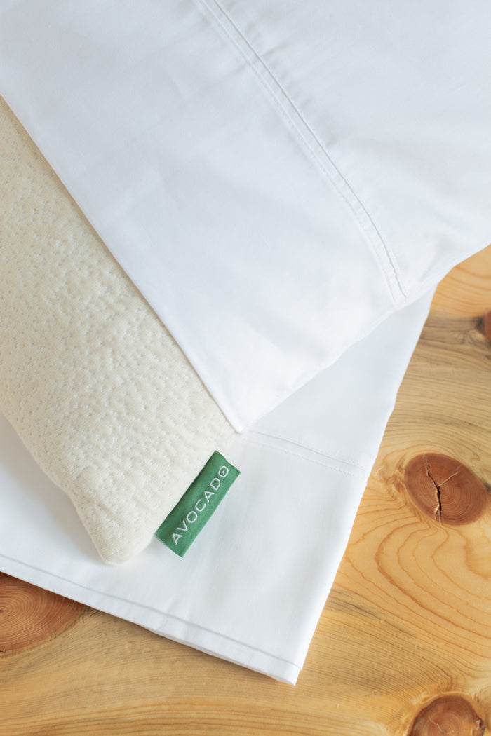White organic cotton pillowcase edge with green Avocado tag