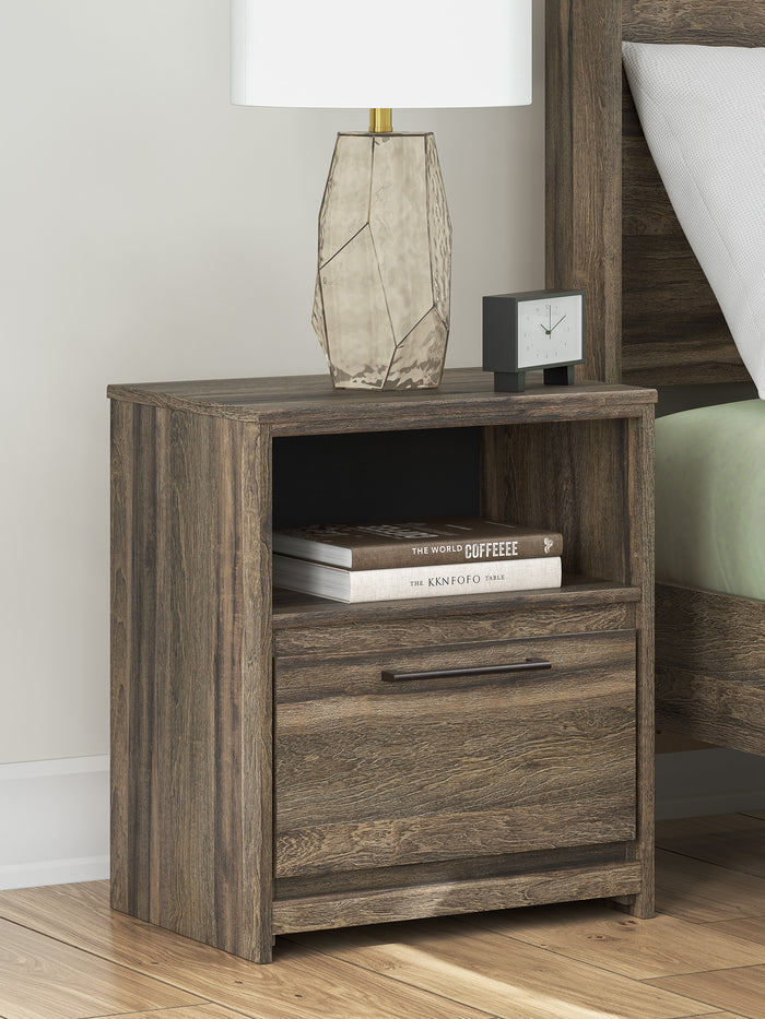 Wood nightstand in dark gray with open shelf, lower drawer, and metal bar handle.