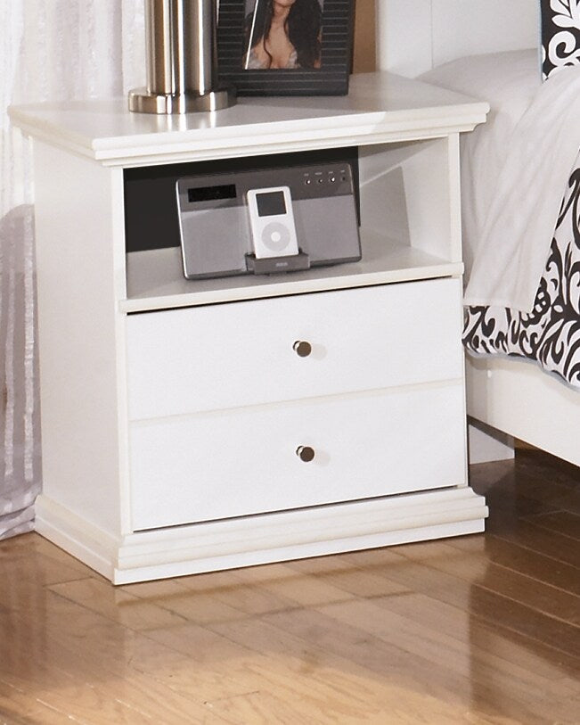 White nightstand with open shelf and two drawers with round brass-tone pulls