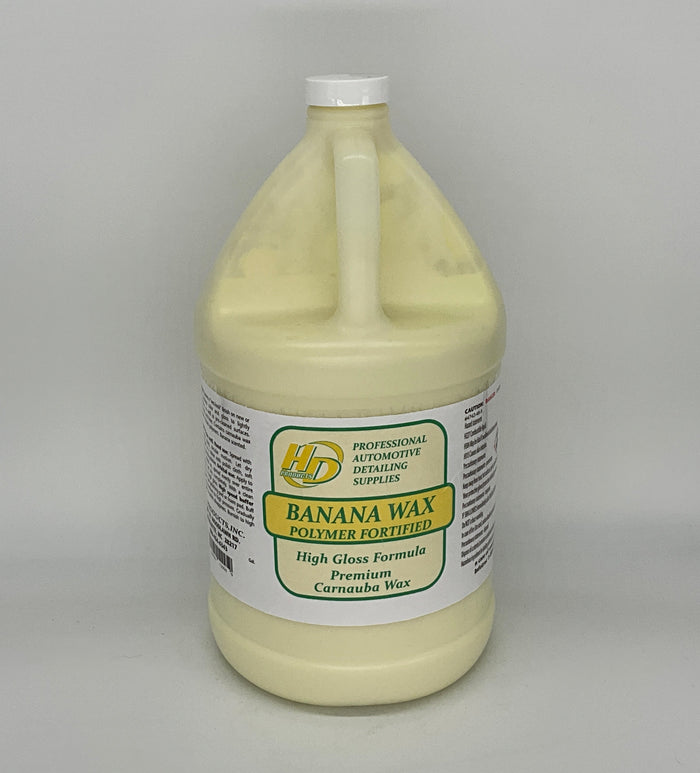 1 Gallon container of banana wax polymer on a gray background