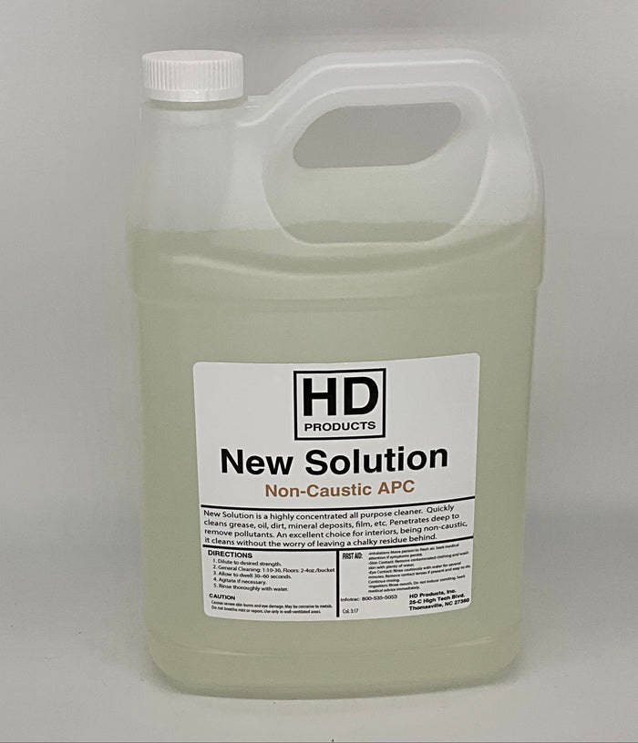 1 gallon of HD Products New Solution Non-Caustic APC on a gray background