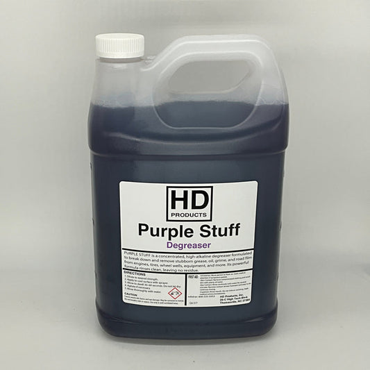 1 gallon Bottle of HD Products Purple Stuff Degreaser on a gray background