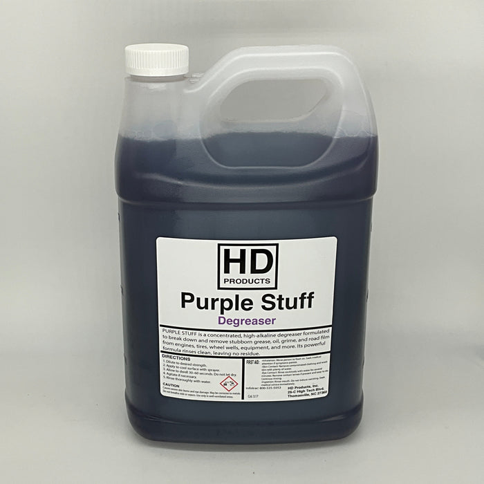 1 gallon Bottle of HD Products Purple Stuff Degreaser on a gray background