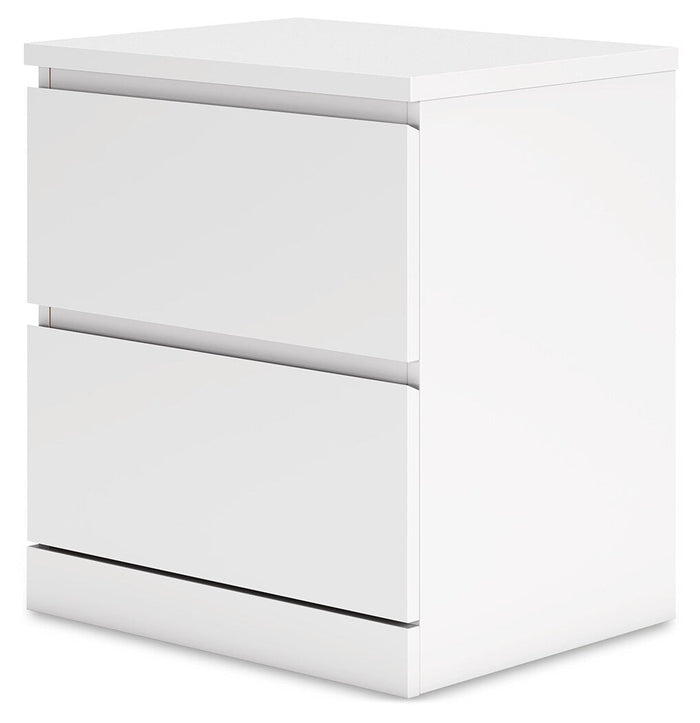 White nightstand with stacked drawers and slim metal bar pulls