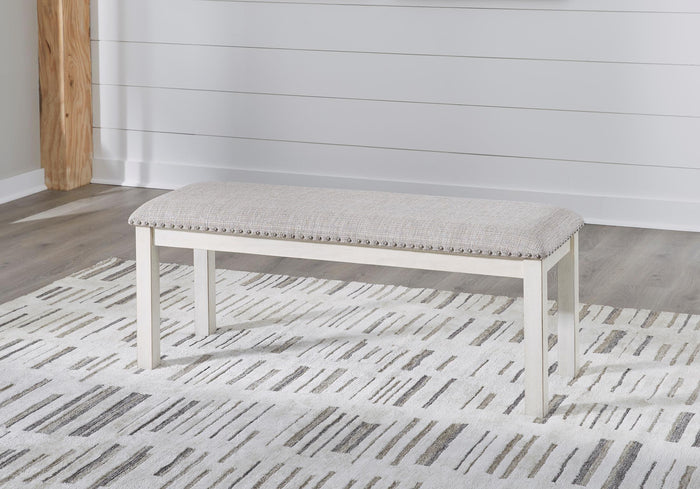 48-inch upholstered dining bench with light wood legs and light gray tufted seat