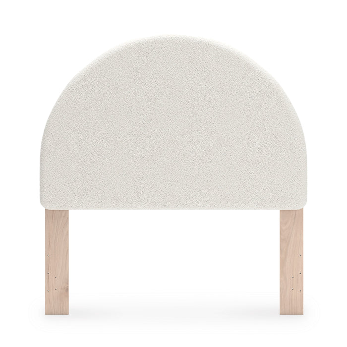 Upholstered headboard, rounded light beige upholstered panel with wood legs