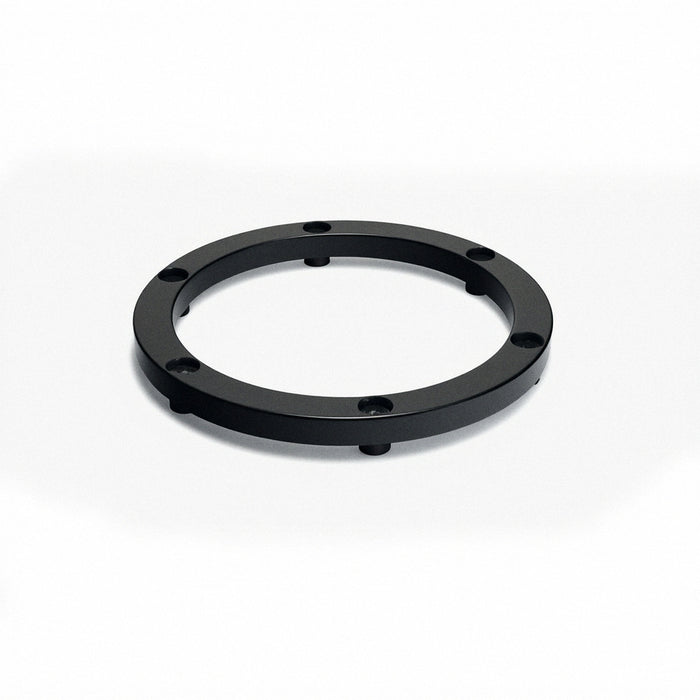Black circular elevator ring base with four small legs and mounting holes