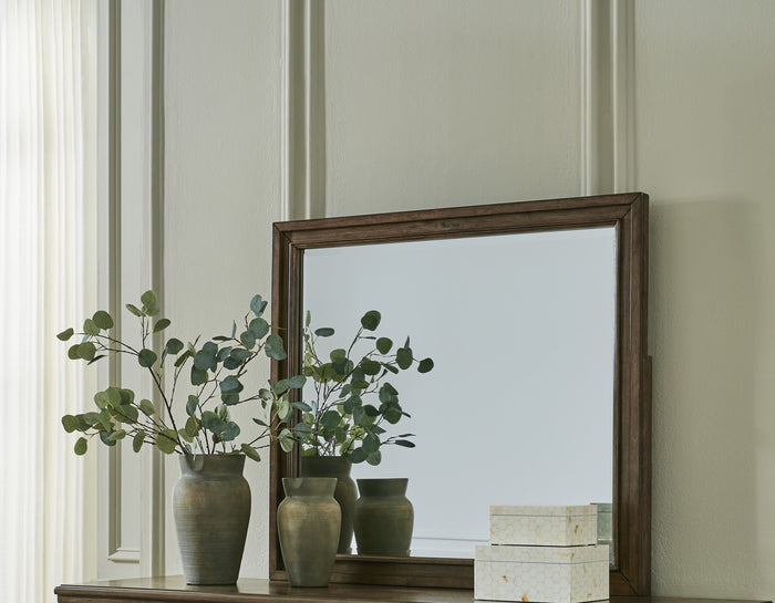 Bedroom mirror with weathered dark wood frame and rectangular glass panel