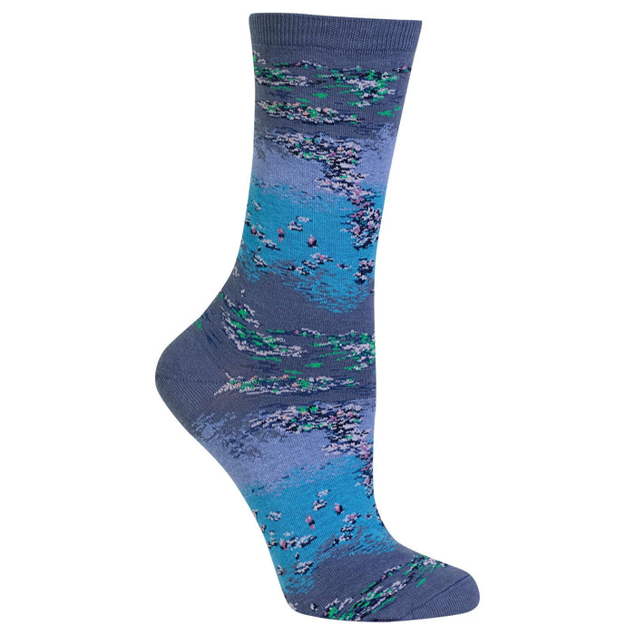 A pair of crew socks with a floral pattern in shades of blue and green.