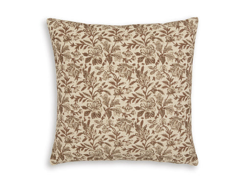Square throw pillow with tan base and brown botanical leaf pattern.