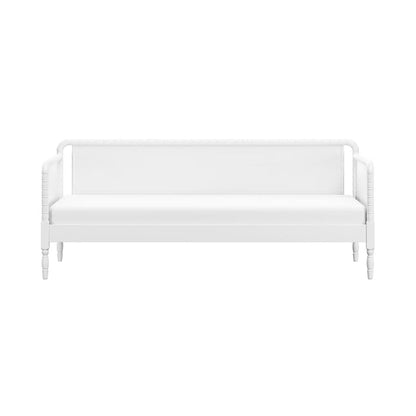 A white outdoor daybed with a woven rattan frame, featuring a padded seat cushion and backrest, shown against a solid white background.