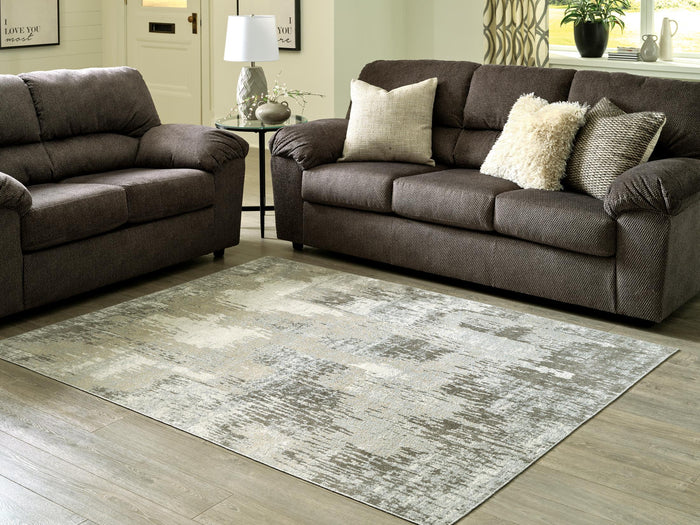Abstract distressed area rug, light gray and ivory, rectangular with textured surface