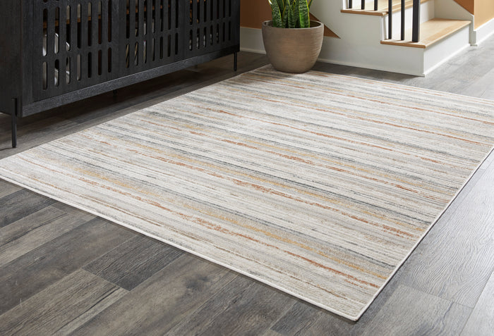 Light gray striped area rug with tan accents, flat-weave texture