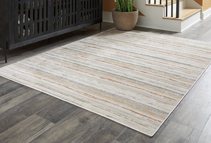 Light gray striped area rug with tan accents, flat-weave texture