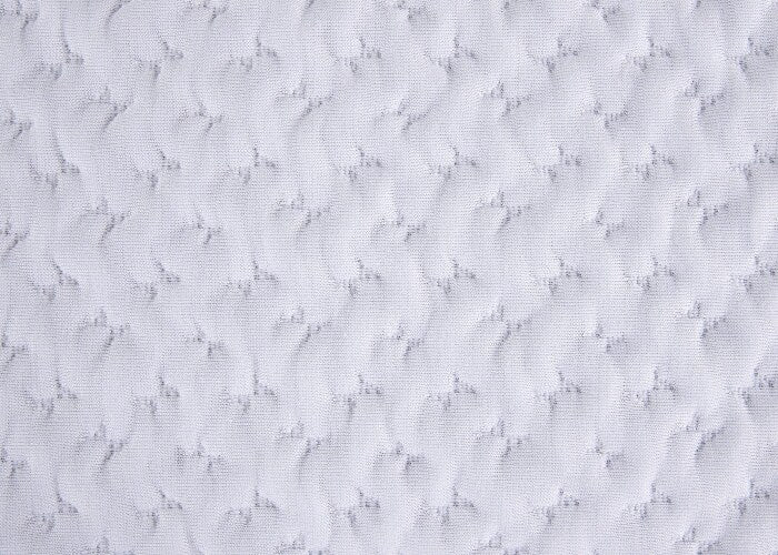 Performance pillow 1.0, close-up of white quilted fabric texture