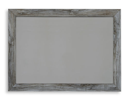 Light gray wood-framed bedroom mirror with rectangular beveled edges