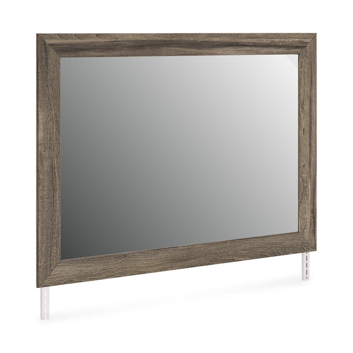 Brown wood bedroom mirror angled view with simple rectangular frame
