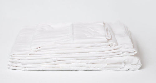 White microplush bamboo split head king sheet set, neatly folded