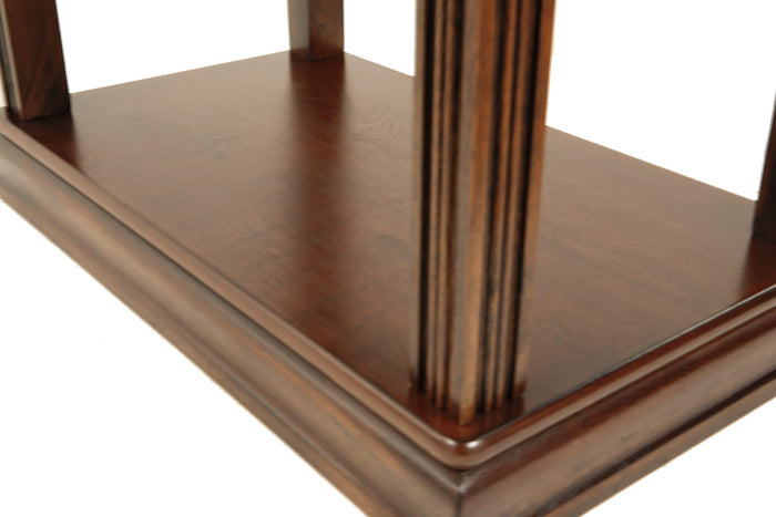 Bottom corner detail of wooden end table with raised border