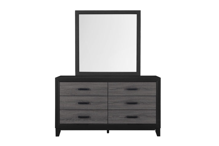 Rectangular black-framed mirror mounted on dark dresser