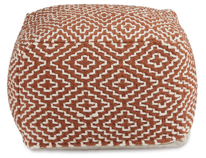 Orange geometric pouf side view with repeating cross-in-diamond motifs.