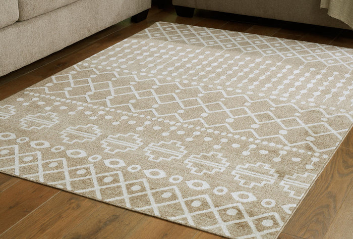 Light beige area rug with white geometric grid and diamond pattern