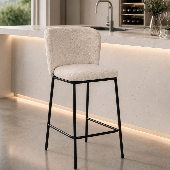 Leather Gallery Carl Bar Chair in Beige, featuring a textured upholstered seat and backrest with a slim black metal frame.