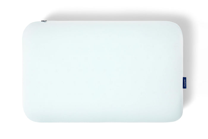 Light blue Casper hybrid snow pillow, rectangular shape with small top seam and logo tag
