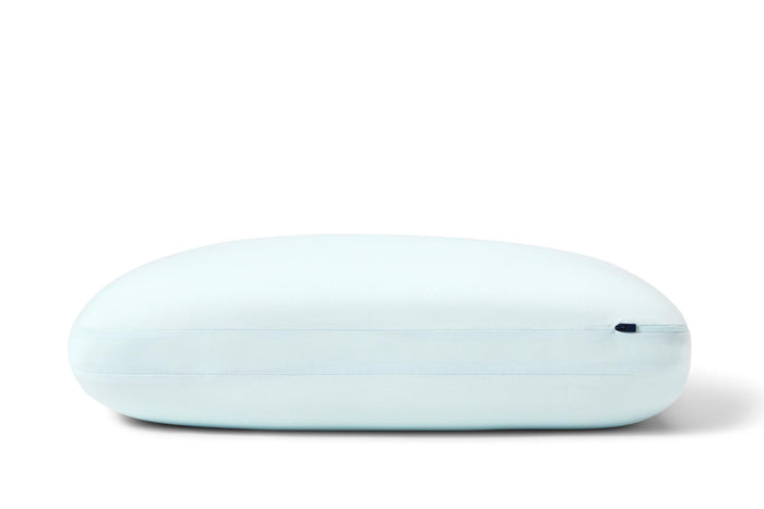 Light blue Casper hybrid snow pillow, oval profile with side seam and small logo detail