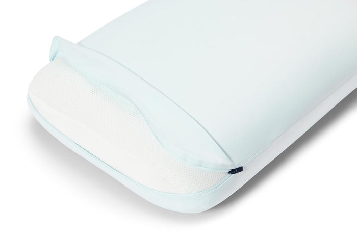 Light blue Casper hybrid snow pillow cover close-up with breathable mesh panel and zipper edge