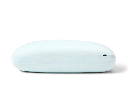 Light blue Casper hybrid snow pillow, centered oval side view with subtle seam line