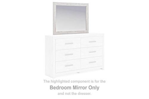 Rectangular bedroom mirror with light frame, shown above a white dresser