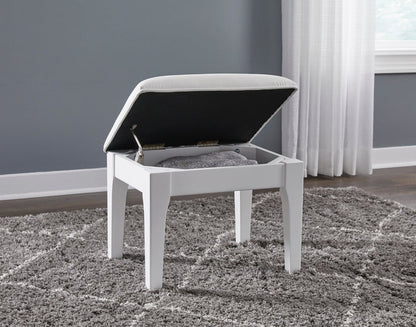 Lift-top vanity stool with open storage compartment and gray padded interior