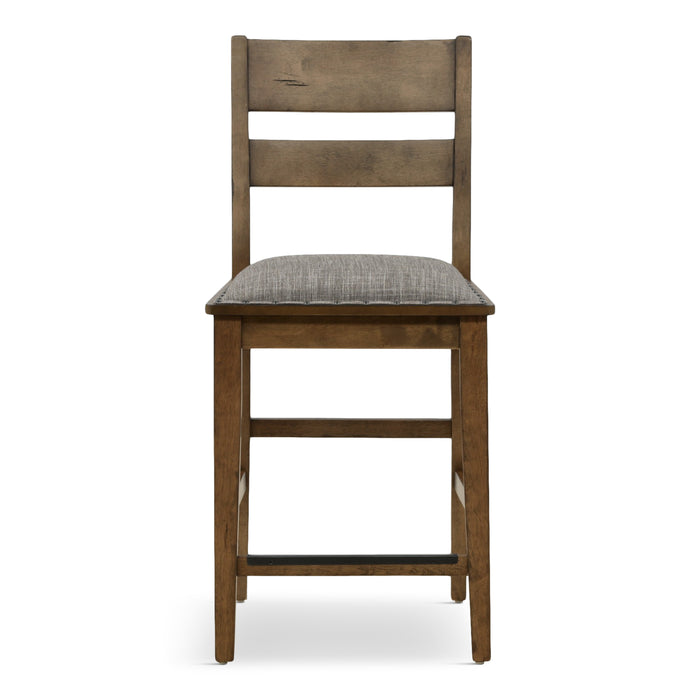 Ladder back dining chair with gray fabric seat cushion and distressed brown wood frame