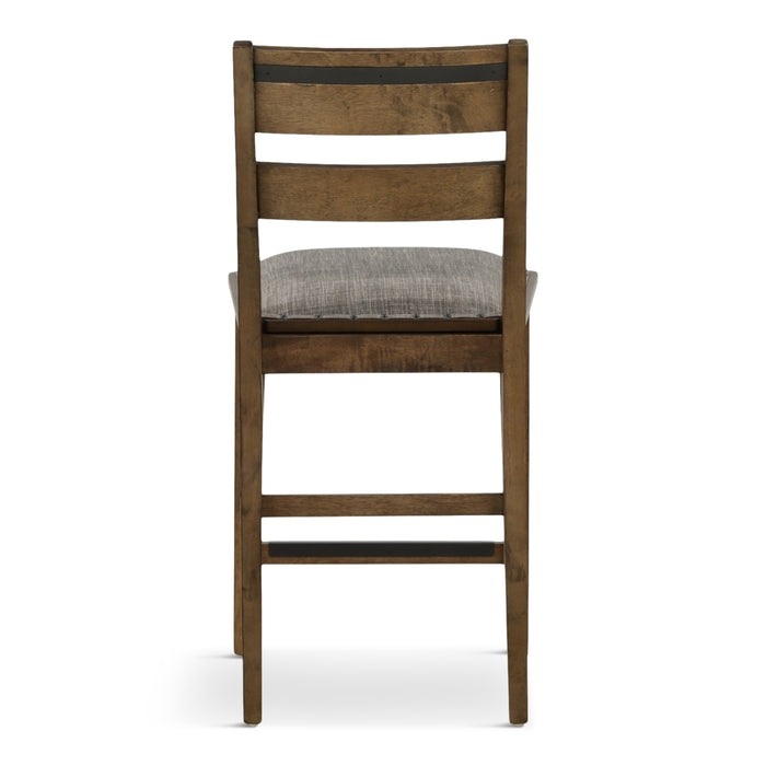 Ladder back dining chair with gray upholstered seat and distressed brown slatted back