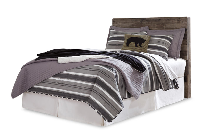 Dark wood panel headboard with squared top in a side view of the bed
