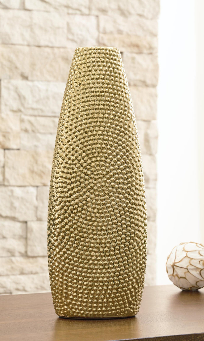Gold textured taper vase with bead-like pattern, rounded base and narrow neck