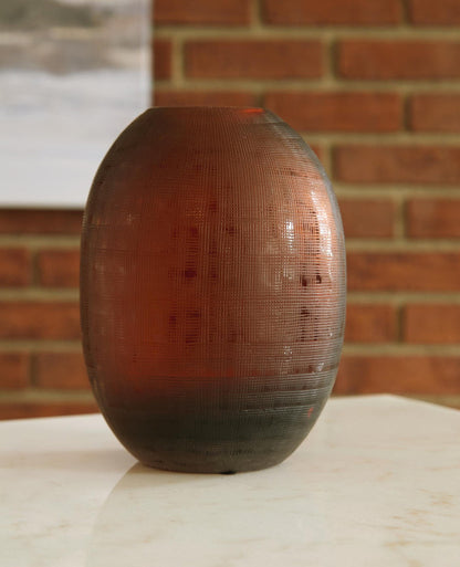 Hammered copper-orange ceramic vase with rounded body and short rim