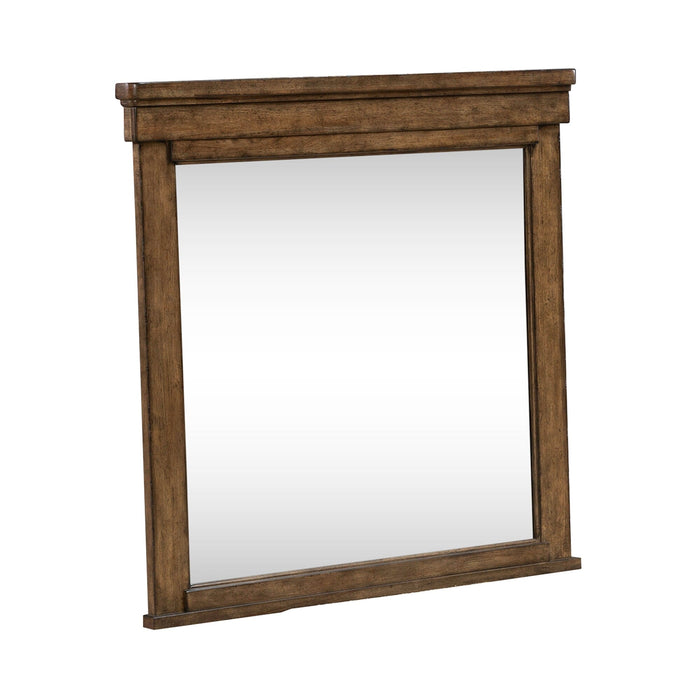 Rectangular wall mirror with distressed dark wood frame, angled view
