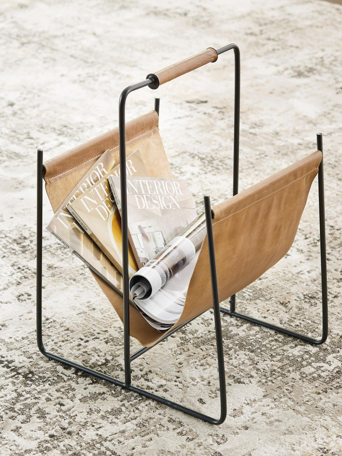 Black metal magazine rack with curved frame and light wood side panels holding magazines.