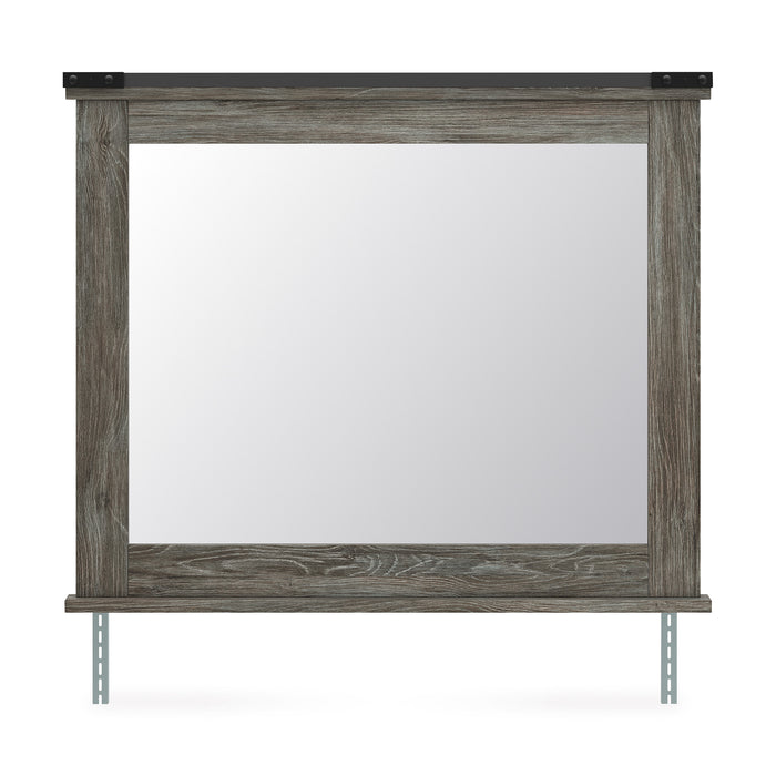 Rectangular bedroom mirror with weathered gray wood frame and two visible support legs