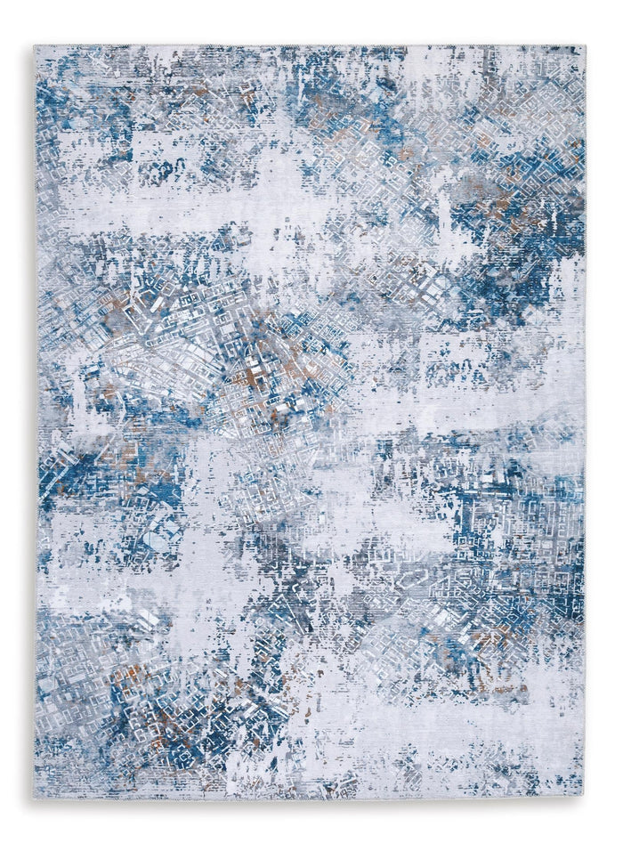 Blue-and-white abstract area rug, distressed pattern, rectangular 5x7 size.