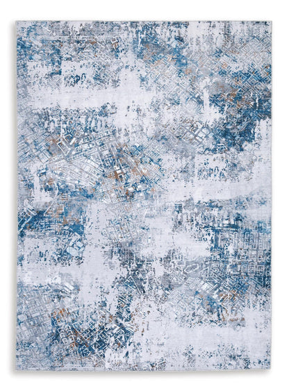 Blue-and-white abstract area rug, distressed pattern, rectangular 5x7 size.