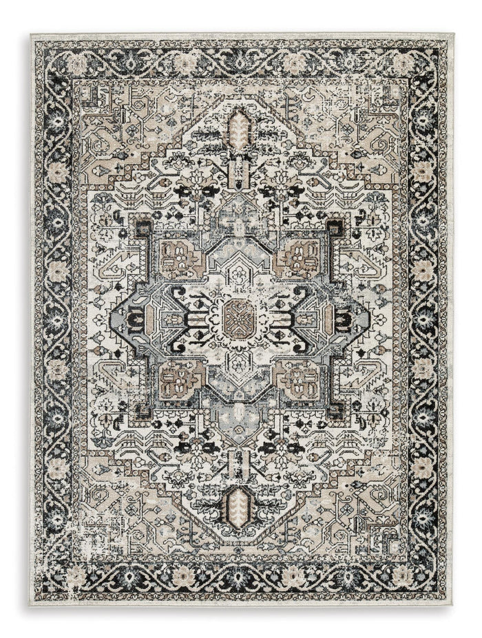 Geometric vintage-style area rug in light gray and black, central medallion border