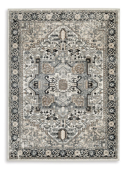 Geometric vintage-style area rug in light gray and black, central medallion border