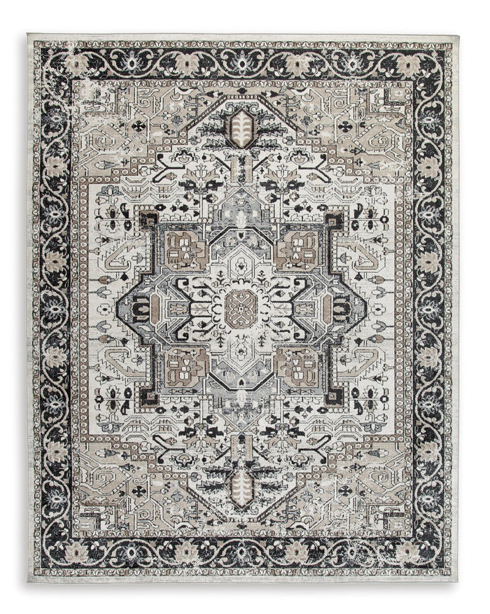 Geometric medallion area rug with black and light gray ornate border