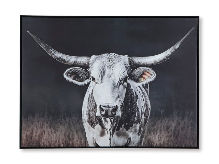 Framed black-and-white cow wall art print with horns and face, centered.