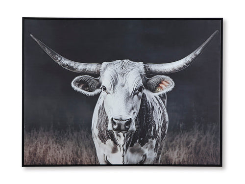 Framed black-and-white cow wall art print with horns and face, centered.