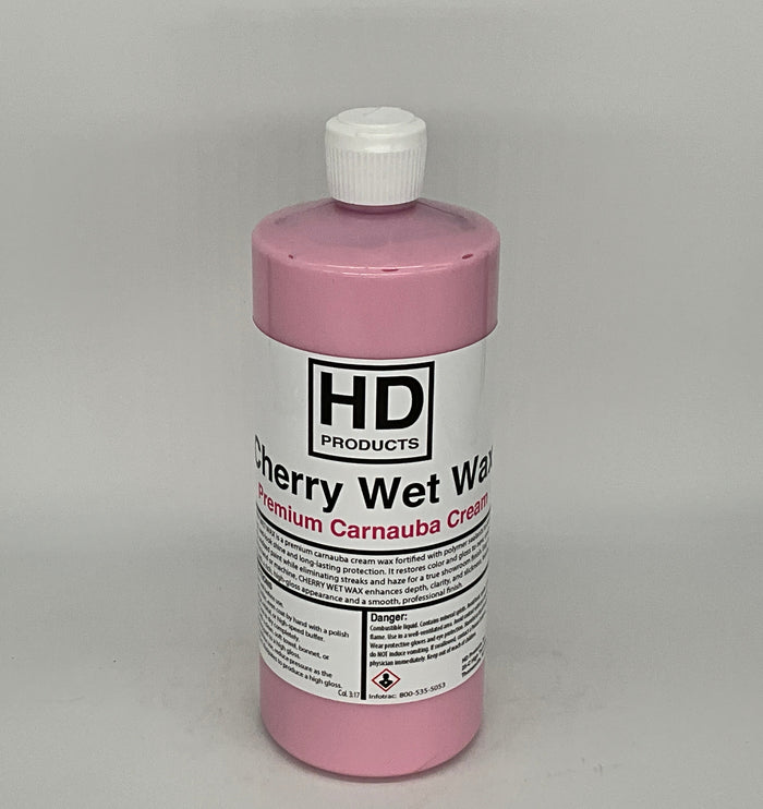 32oz Pink bottle of HD Products Cherry Wet Wax on a gray background